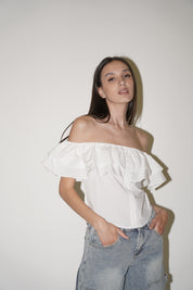 Blusa con spalle scoperte