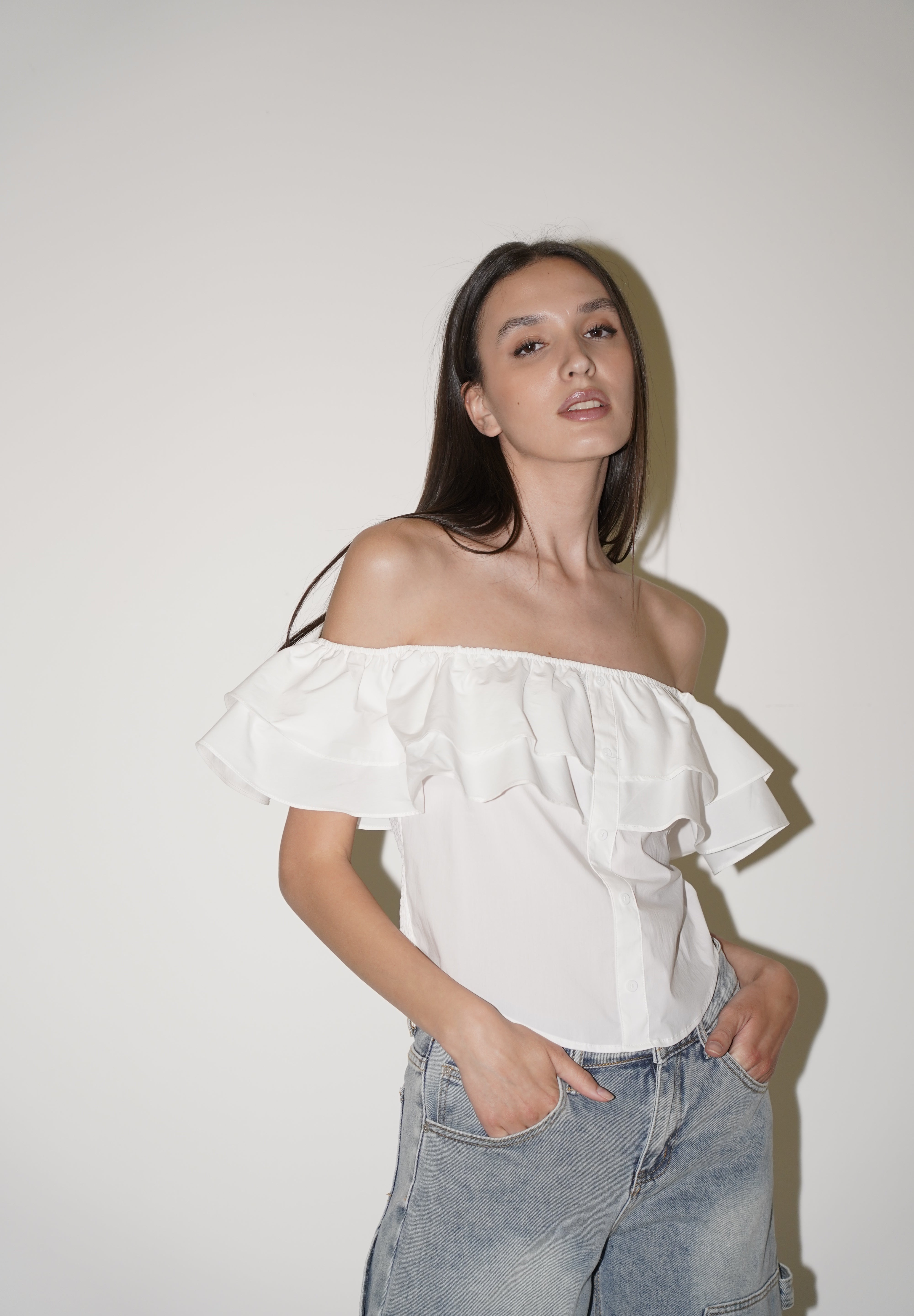 Blusa con spalle scoperte