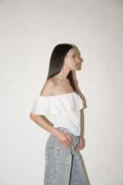 Blusa con spalle scoperte