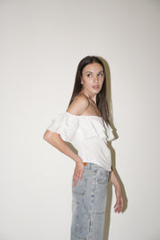 Blusa con spalle scoperte