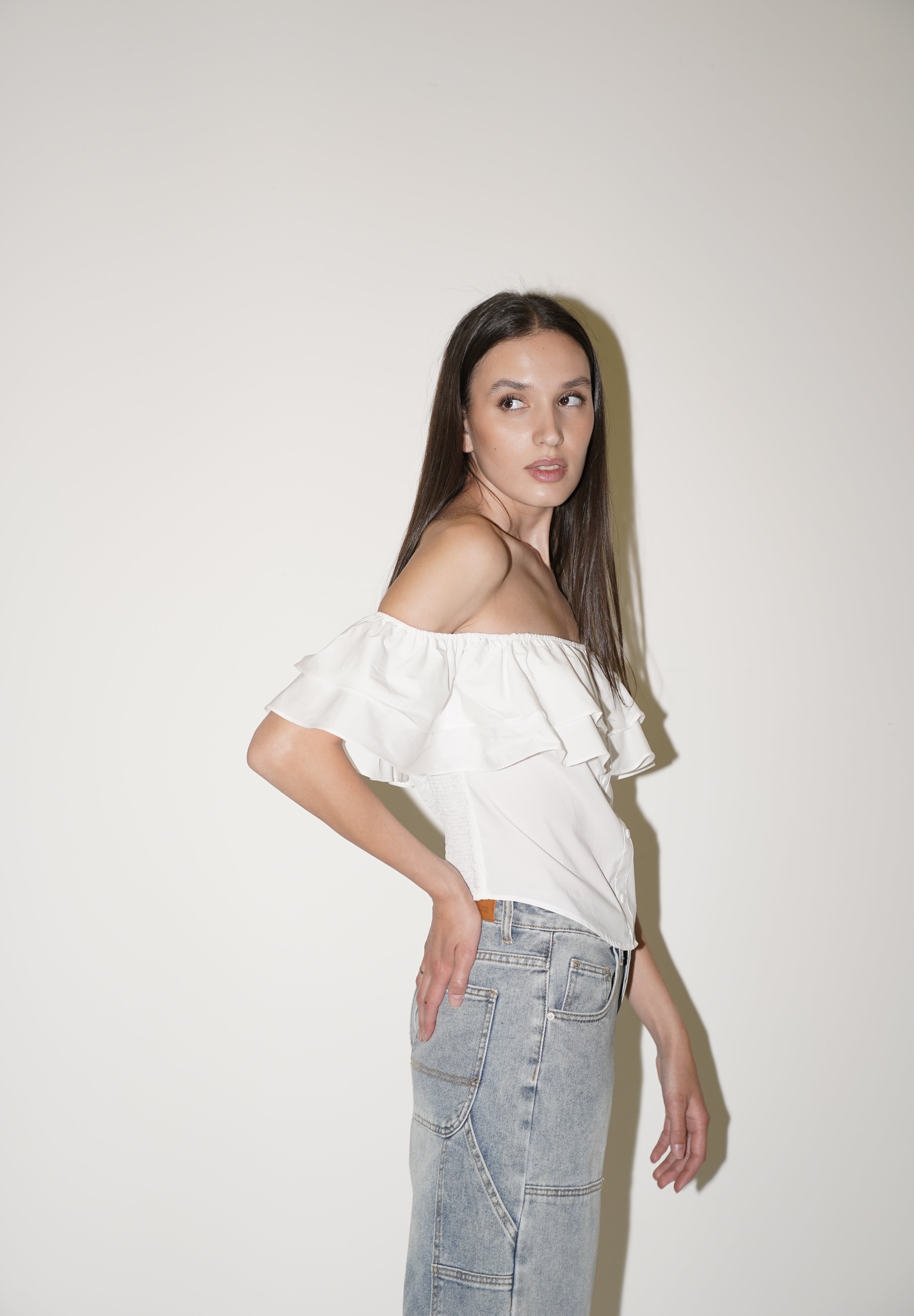 Blusa con spalle scoperte