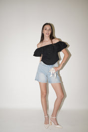 Shorts jeans con accessorio