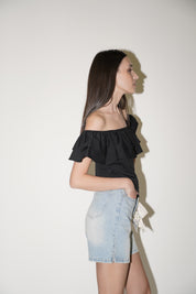 Blusa con spalle scoperte